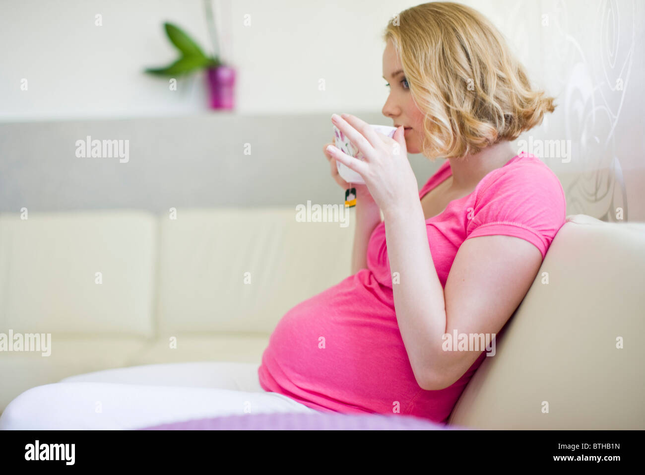 pregnant woman drinking tea Stock Photo Alamy