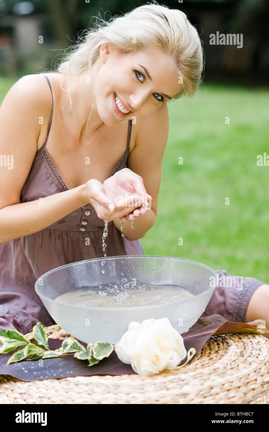 Woman and washing face and 30s hi-res stock photography and images - Alamy