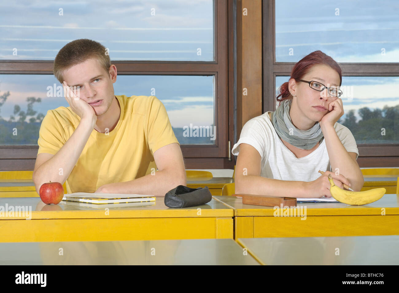 frustrated / bored students in the classroom Stock Photo