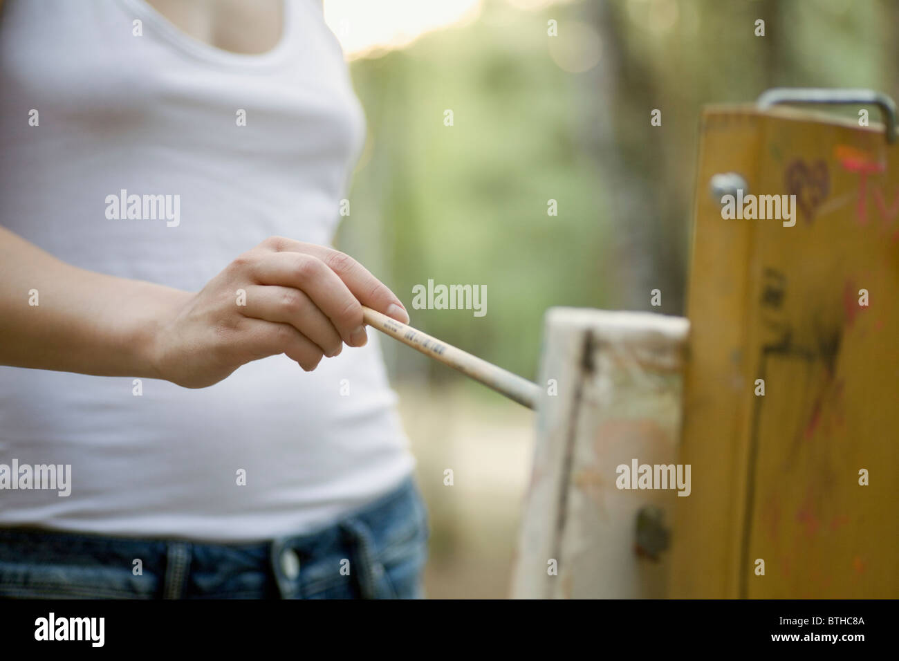 Artists painting on canvas Stock Photo: 32344938 - Alamy