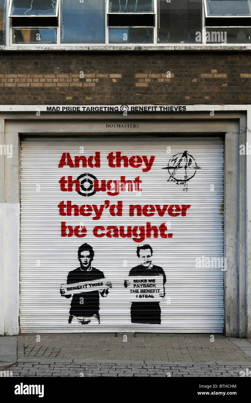 stencil graffiti of benefit fraud advertising campaign, and they thought they'd never be caught. David Cameron George Osborne Stock Photo