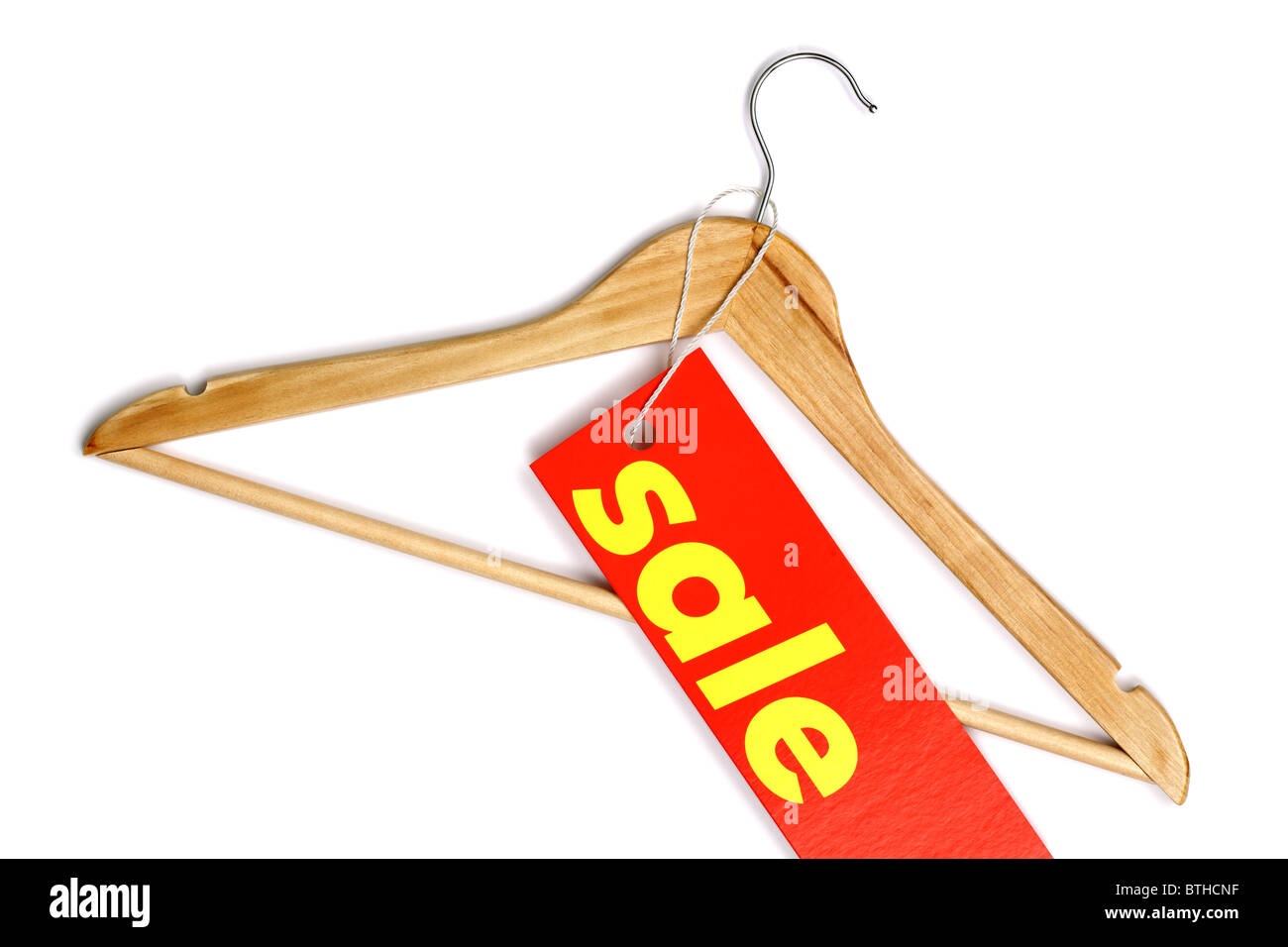 Wooden coat hanger with sale label Stock Photo
