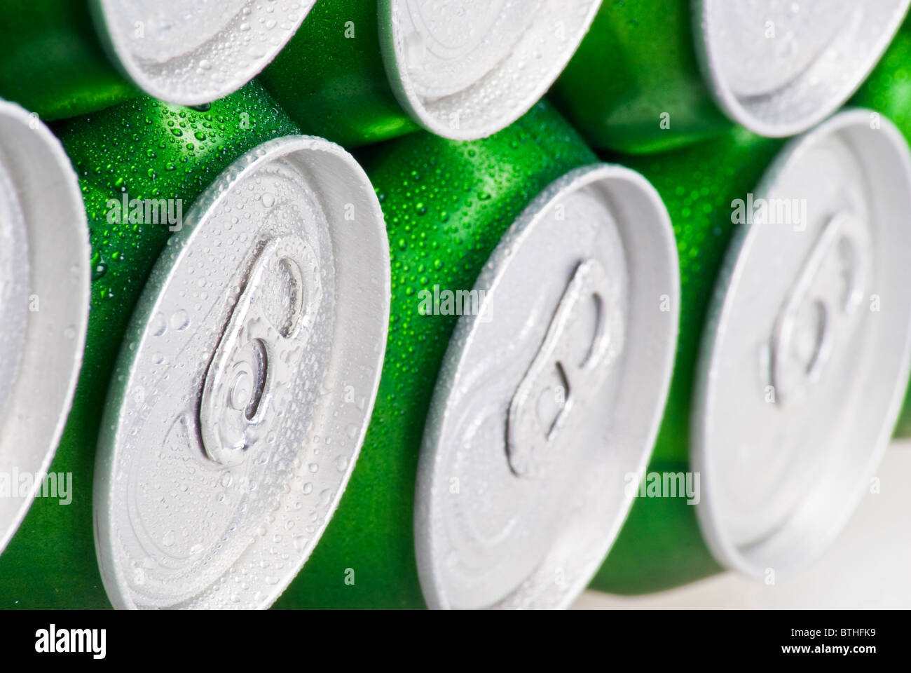 Closeup background of cans stacked up Stock Photo