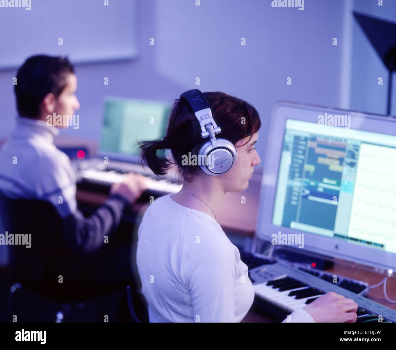 Music writing with the help of a computer, Hamburg, Germany Stock Photo