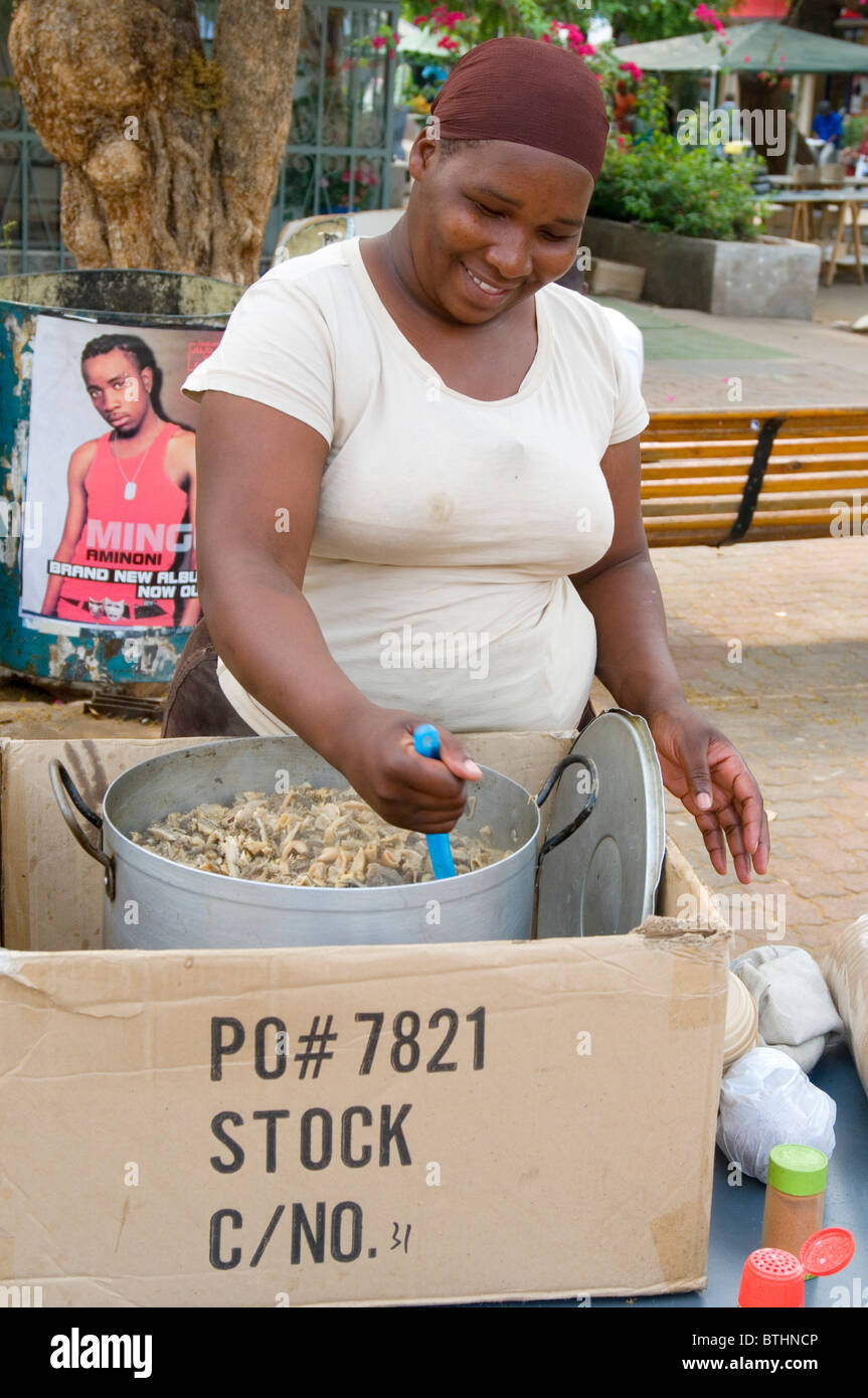 Woman selling meat stew at the Main Mall, Gaborone, Botswana Stock Photo