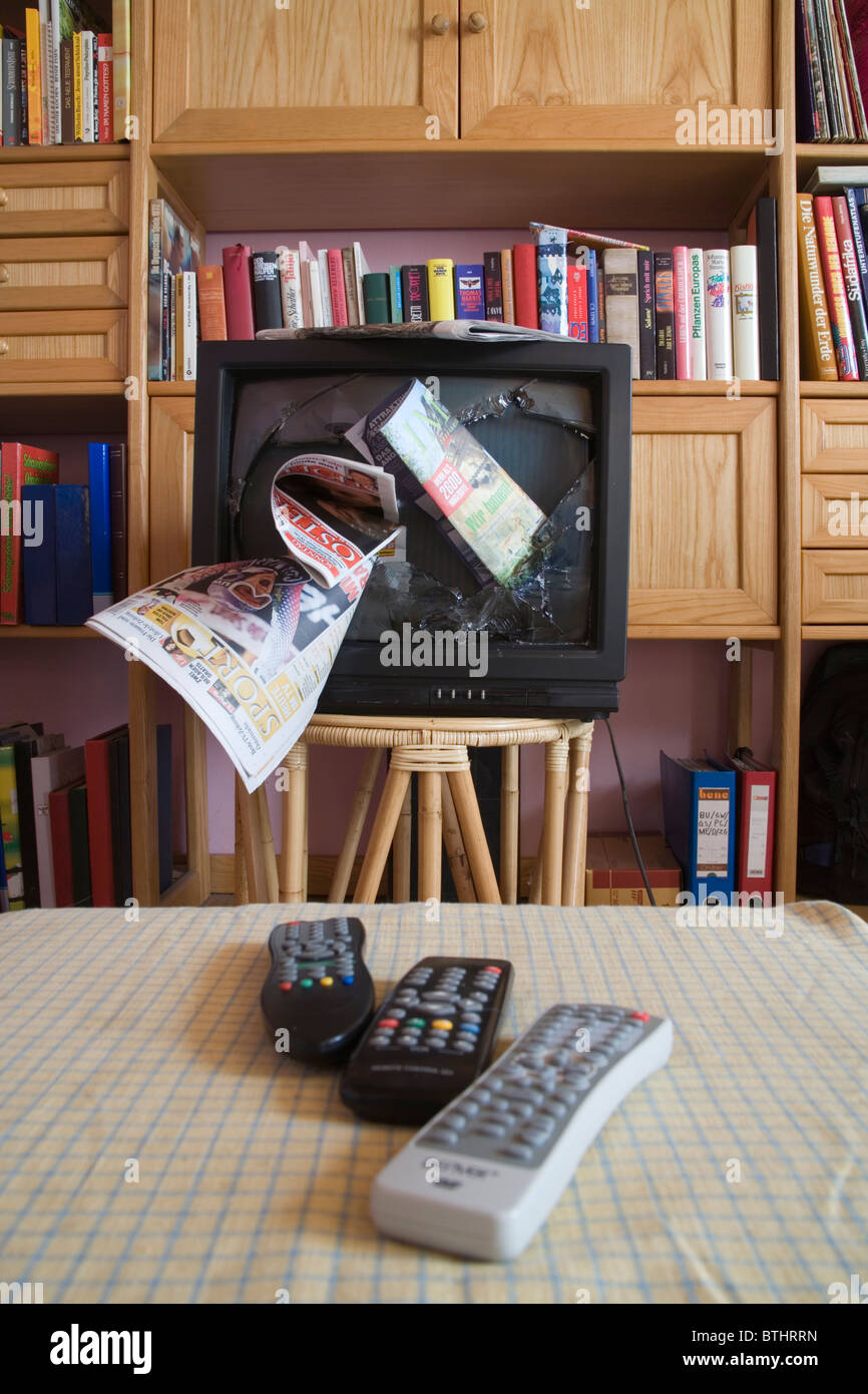 Broken television in a living room Stock Photo