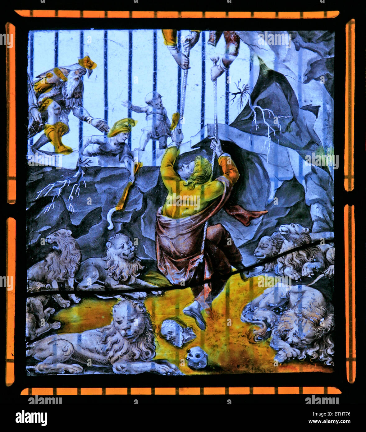 A Stained glass window depicting Daniel being raised from the Lions' Den, Flemish School, Circa 17th Century Stock Photo