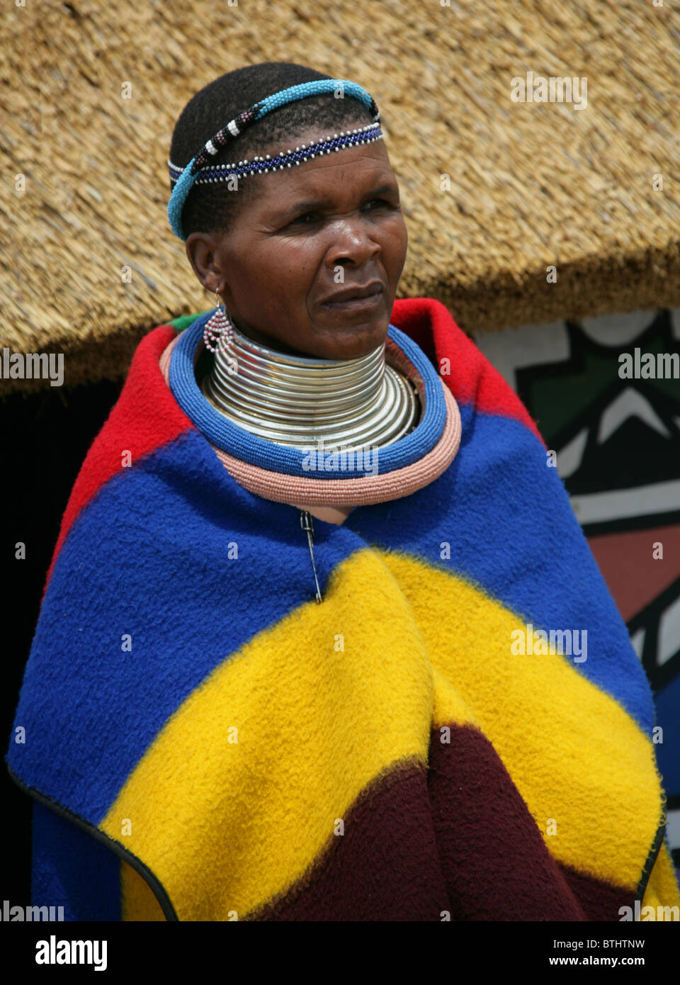 Ndebele Woman in Traditional Costume, Ndelebe Cultural Village, Botshabelo, South Africa. Stock Photo