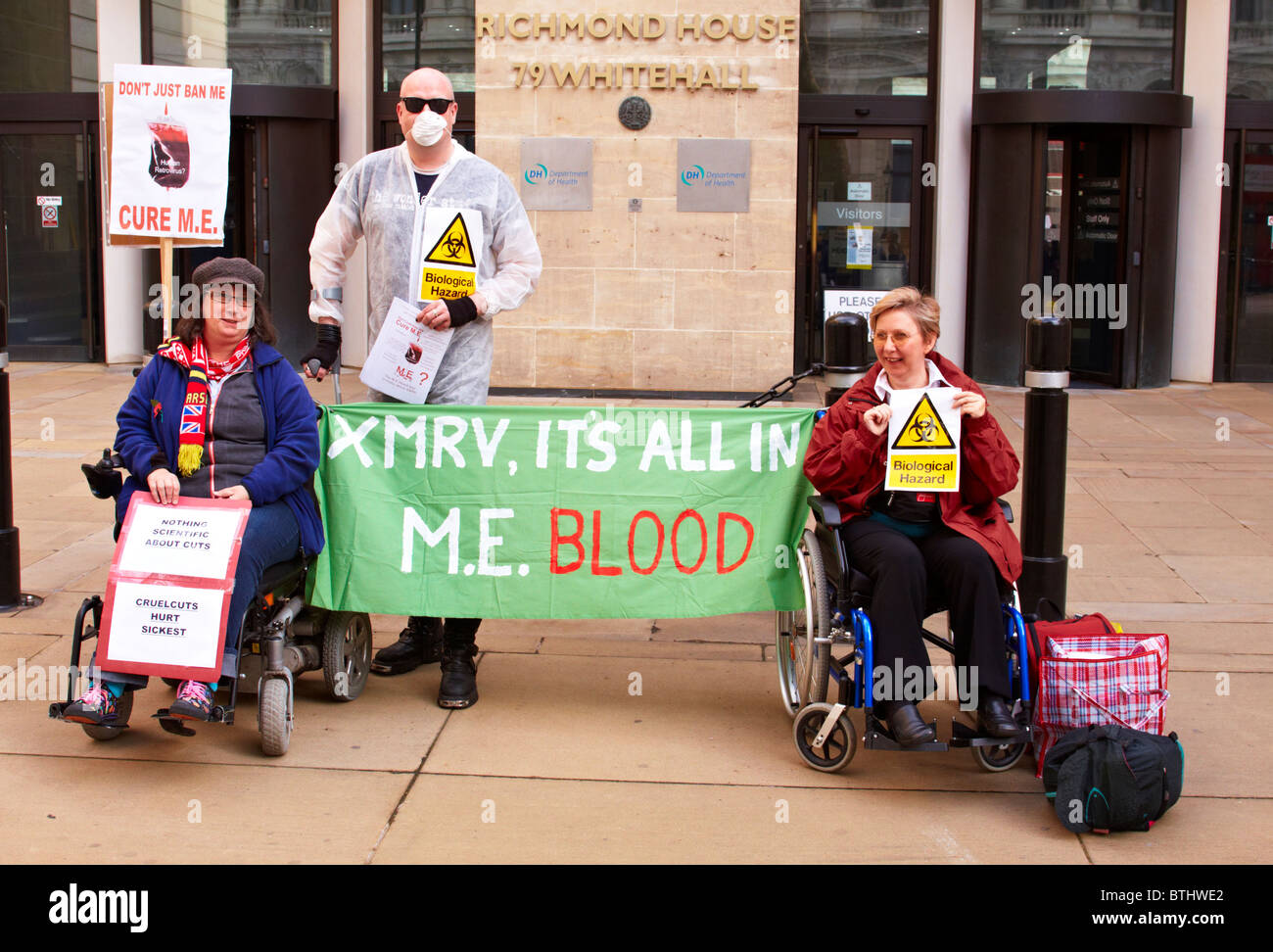 ME or myalgic encephalomyelitis sufferers protest outside the Department of Health on Whitehall Stock Photo