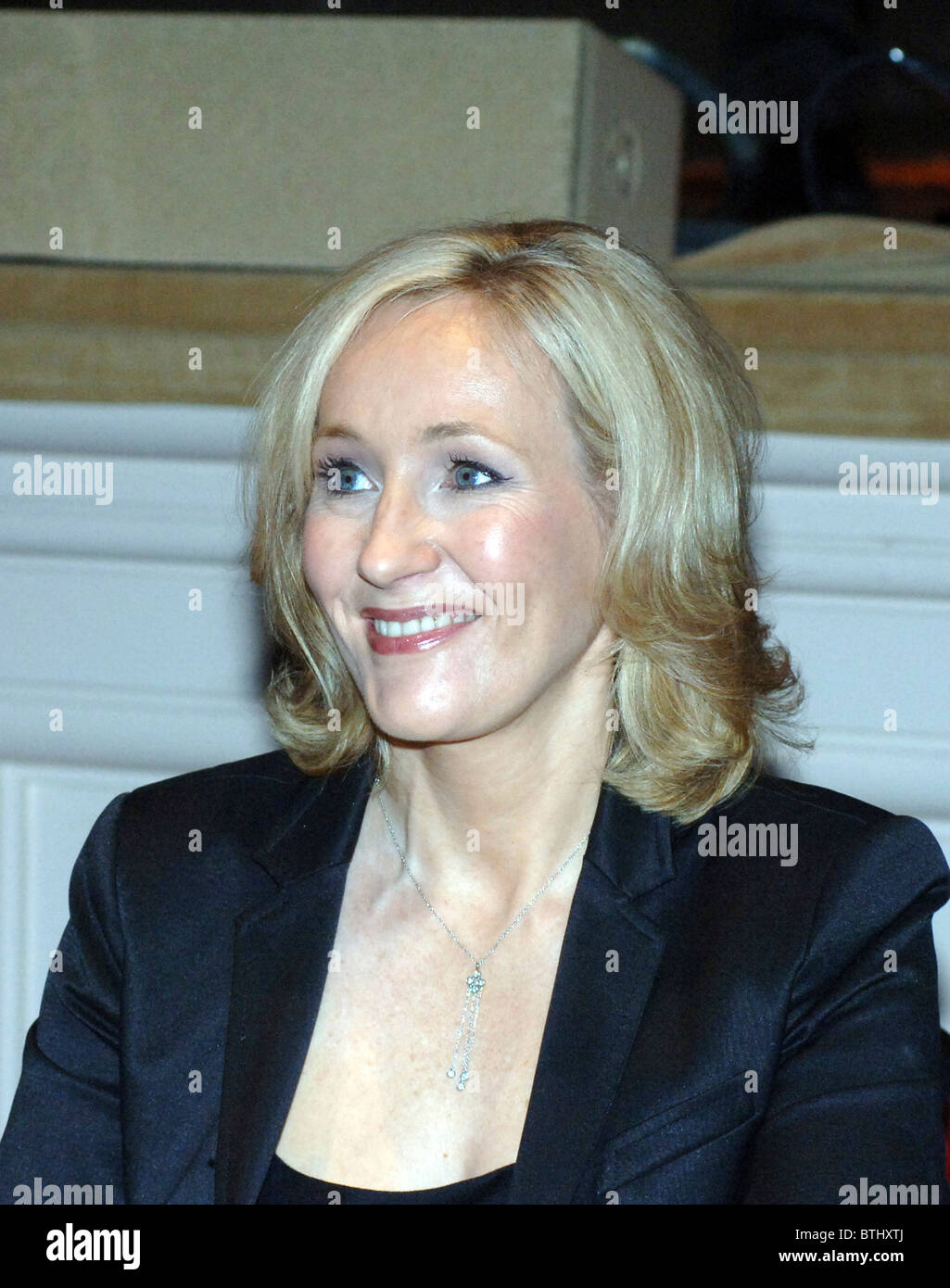 J.K. Rowling signs copies of her book 'Harry Potter and the Deathly Hallows' Stock Photo