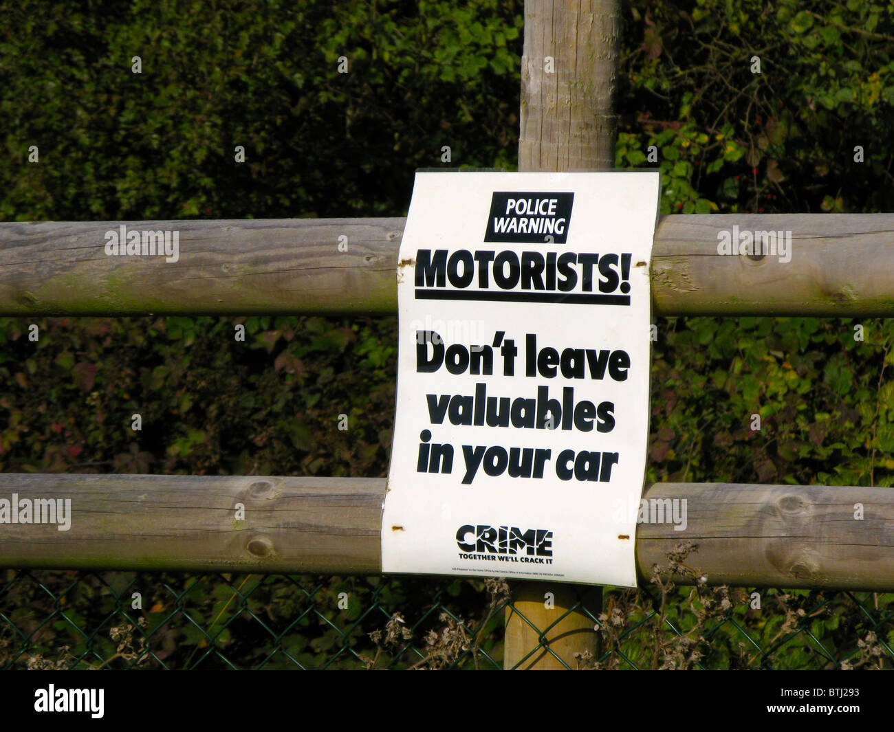 Police warning sign in car park Stock Photo