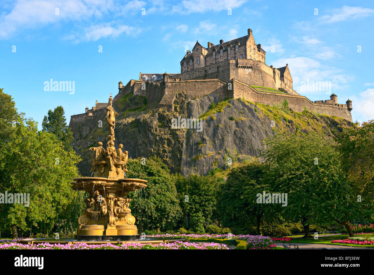 Edinburgh Castle, Scotland, from Princes Street Gardens, with the Ross Fountain in the foreground Stock Photo