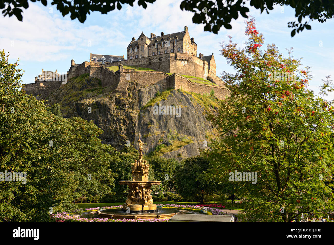 Edinburgh Castle, Scotland, from Princes Street Gardens, with the Ross Fountain in the foreground Stock Photo
