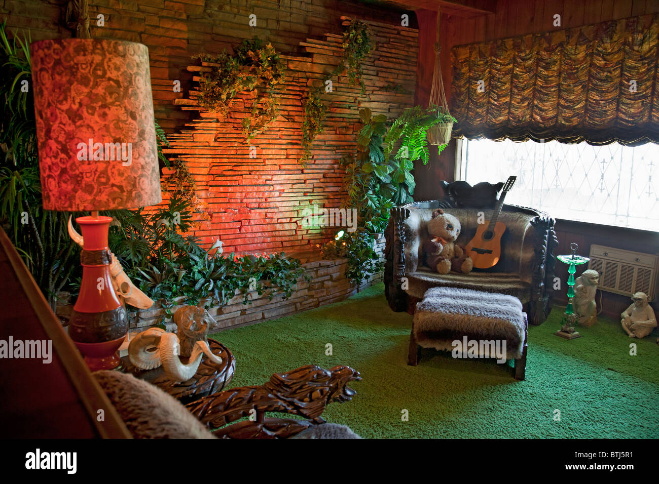 Elvis's Jungle Room at Graceland - shag pile and an African motif. The 'man room'. Stock Photo