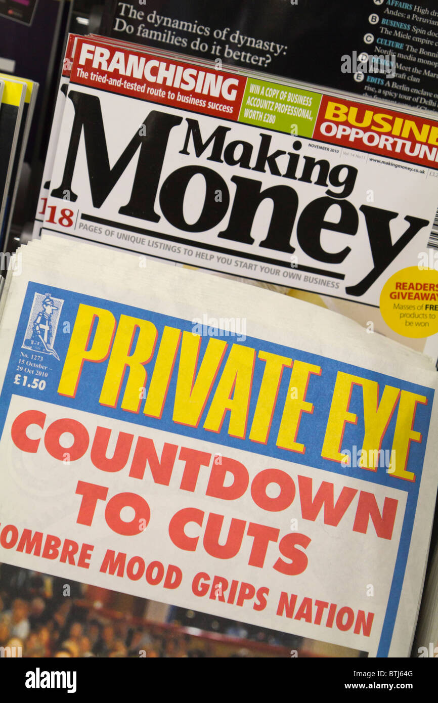 Conflict between people making money from the recession and governments cutting spending - magazine front covers Stock Photo