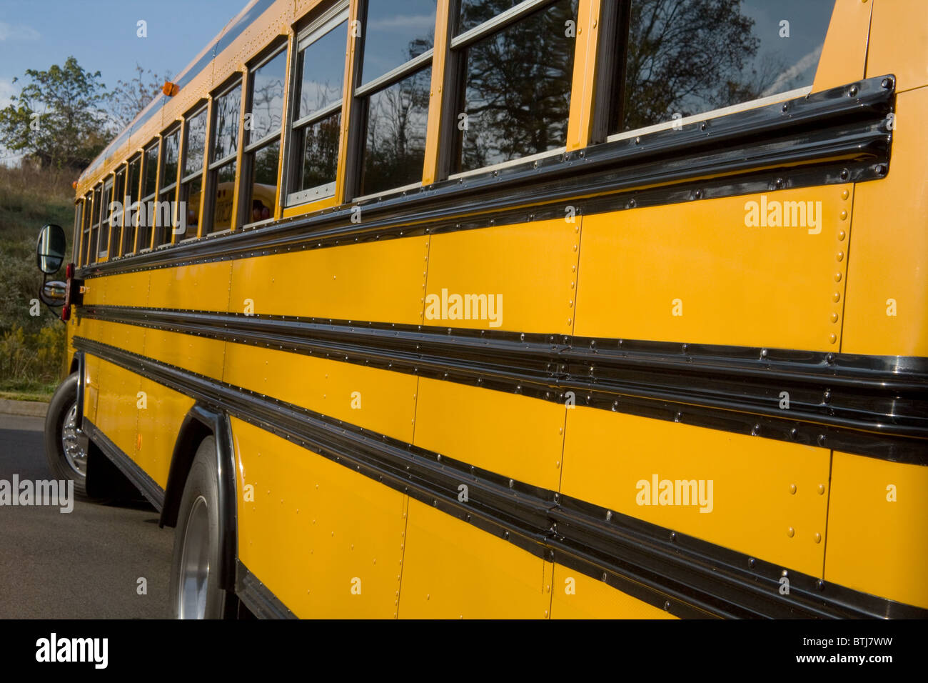 Looking down the side of a school bus. Stock Photo