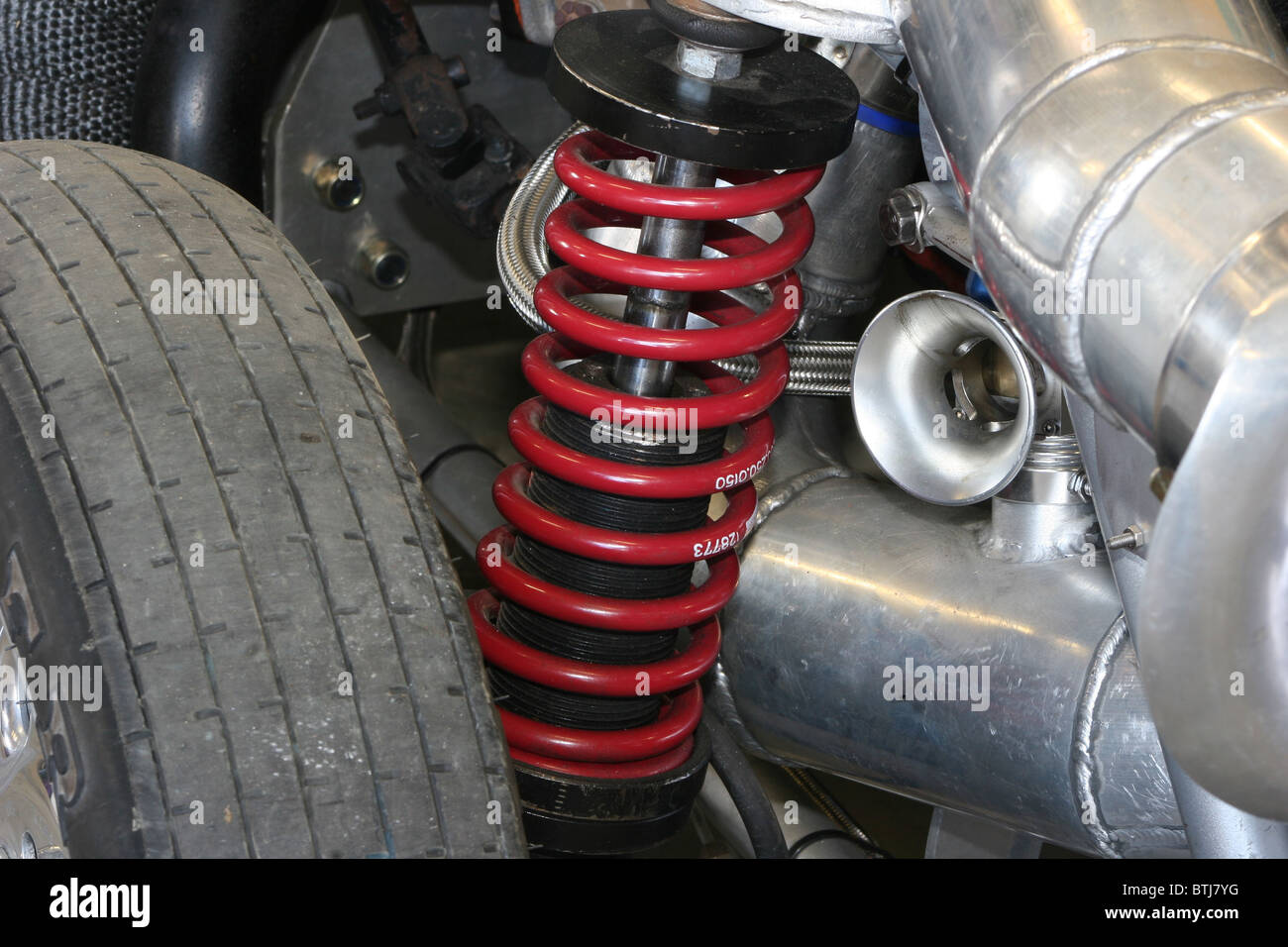 Suspension spring and shock absorber set up on the front of a drag racing car Stock Photo Alamy