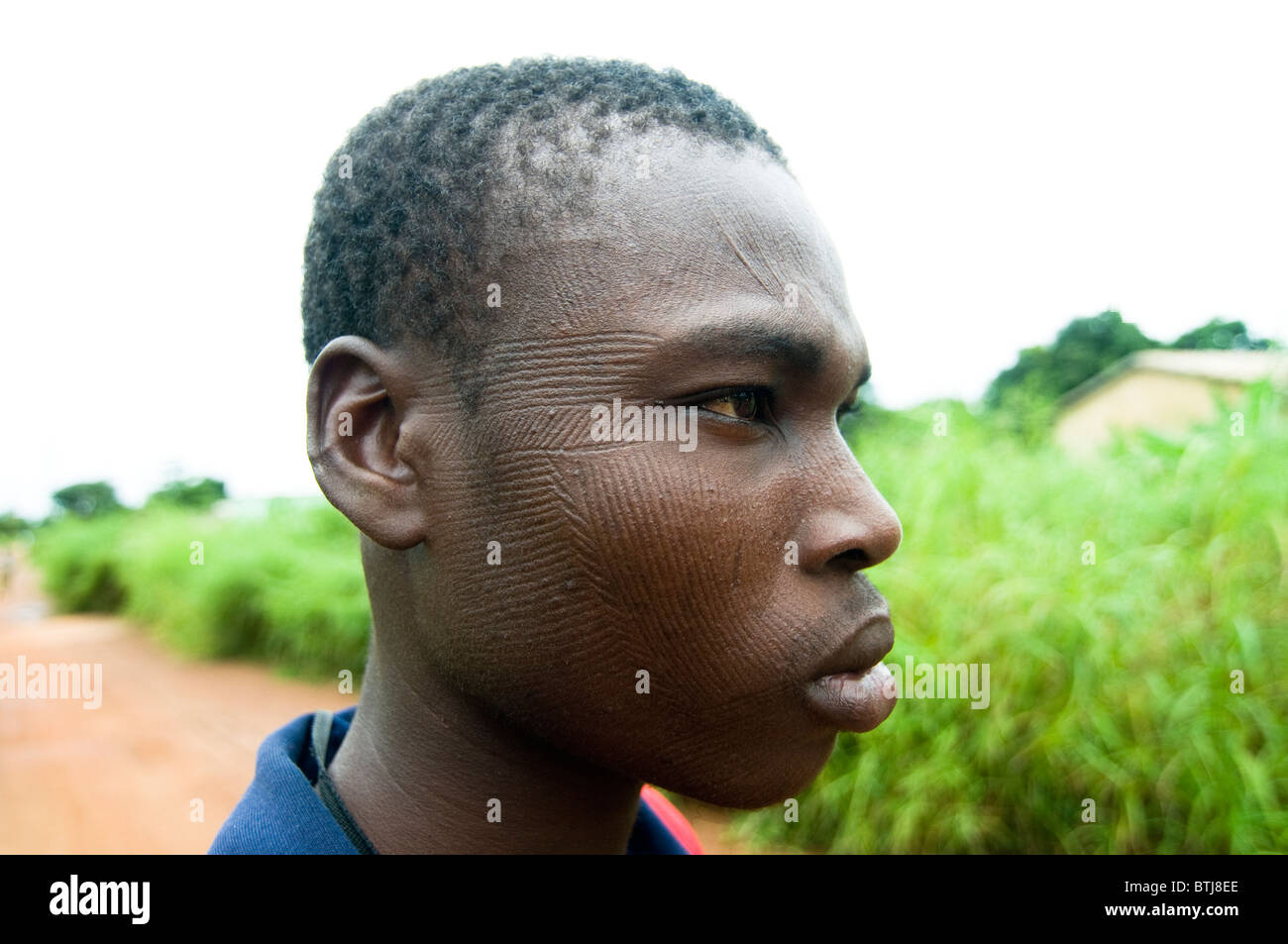 Portrait of a Somba man. the Somba tribe decorate their faces with hundreds of tiny linear scars. Stock Photo