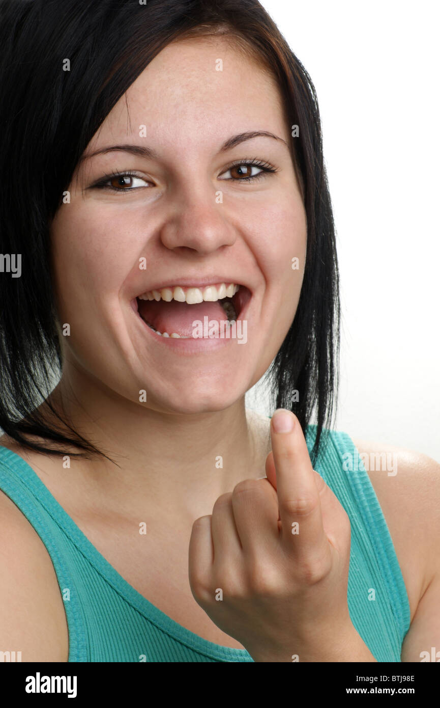 a young woman show with her fingertip Stock Photo Alamy