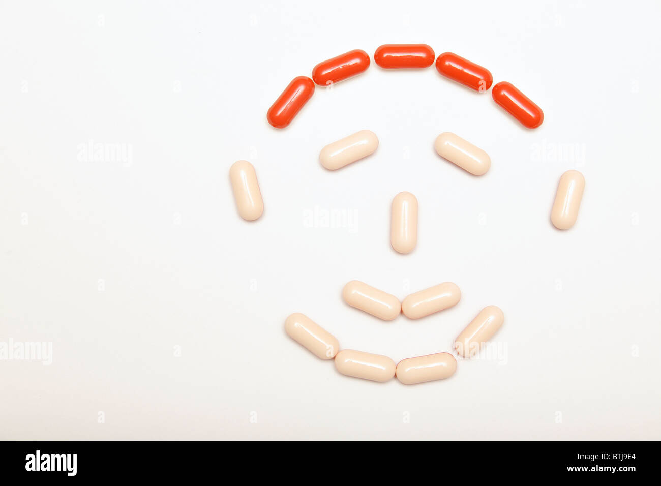 medication and pills face on gray background Stock Photo Alamy