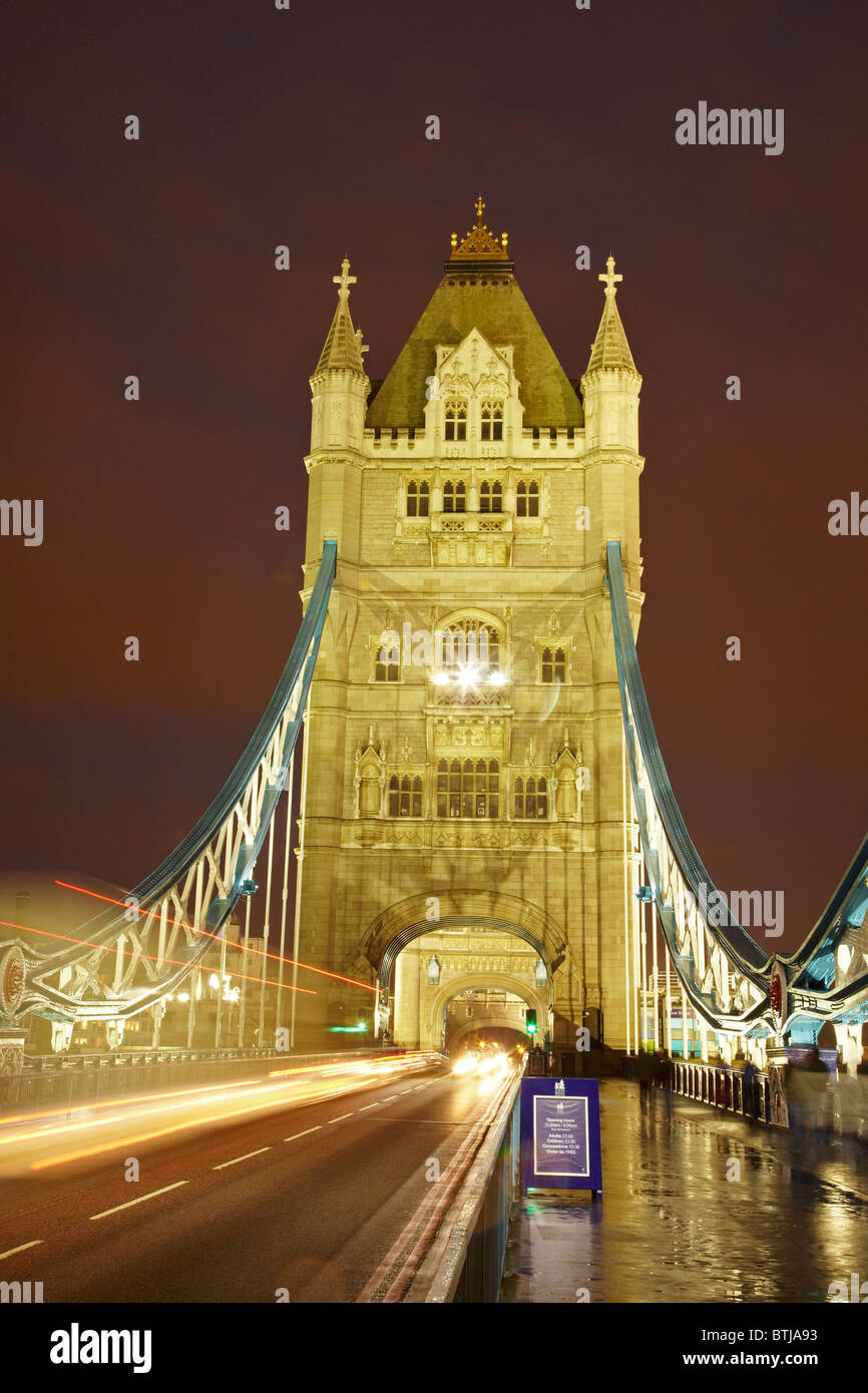 Traffic on Tower Bridge at night, London, England, United Kingdom Stock Photo