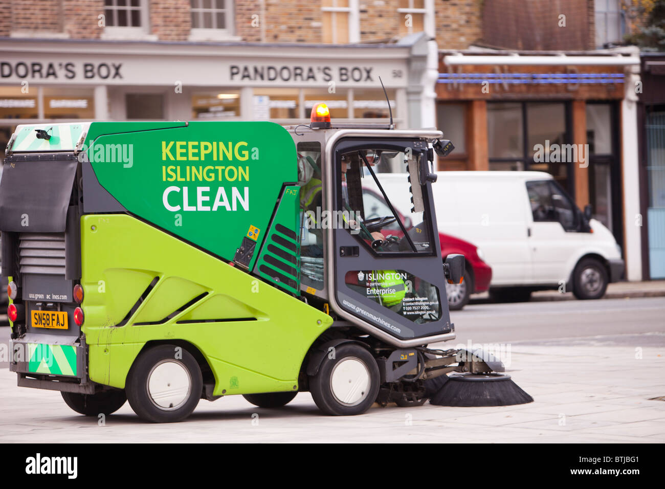 A street cleaning vehicle on the streets of Islington, London, UK Stock