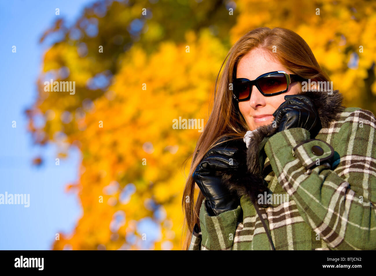 Autumn sunset park - red hair woman fashion in nature Stock Photo - Alamy