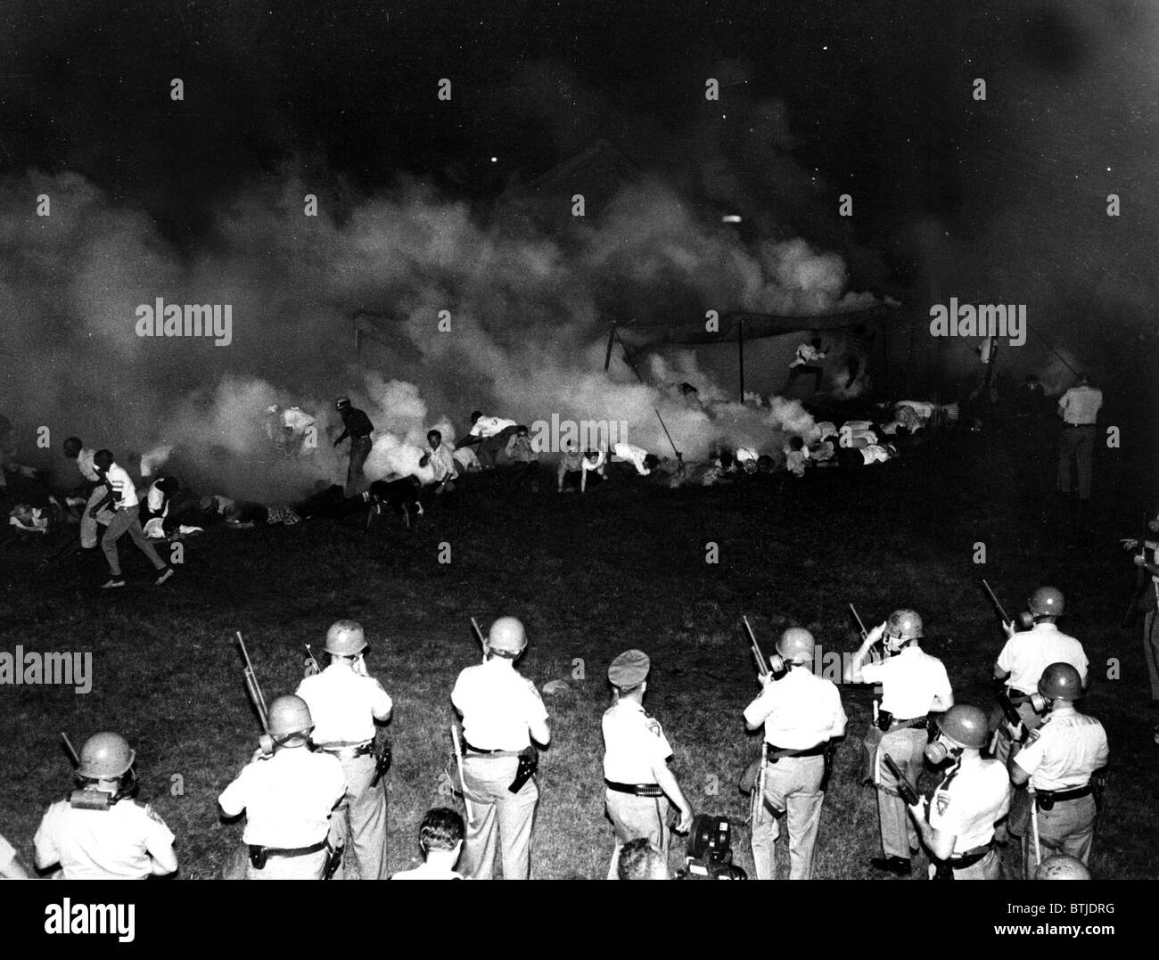 State troopers scatter demonstrators with tear gas, Canton, MS, 12/12/66. Photo by Joe Holloway. Stock Photo