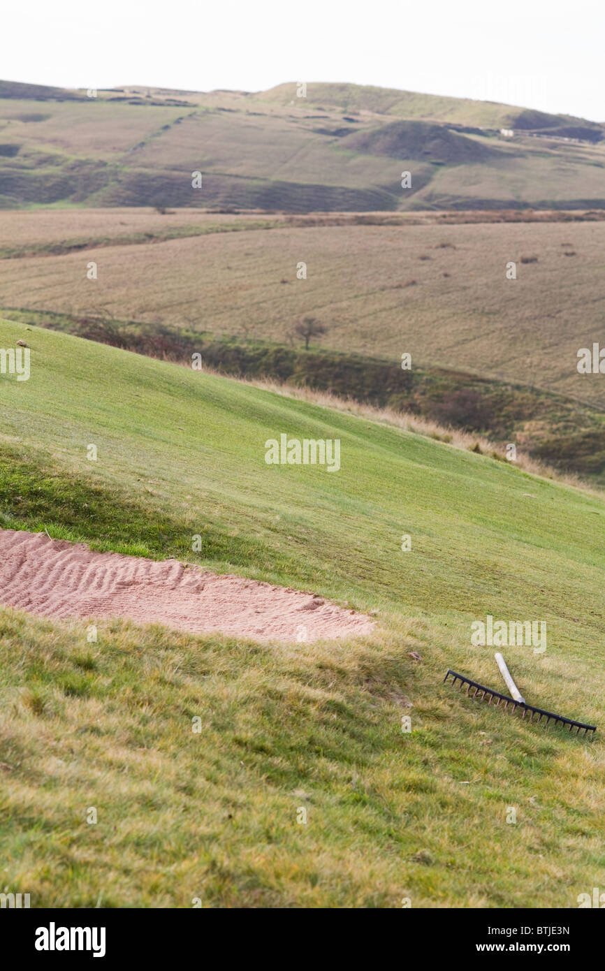 Sand Trap rake pattern in the sand Stock Photo - Alamy