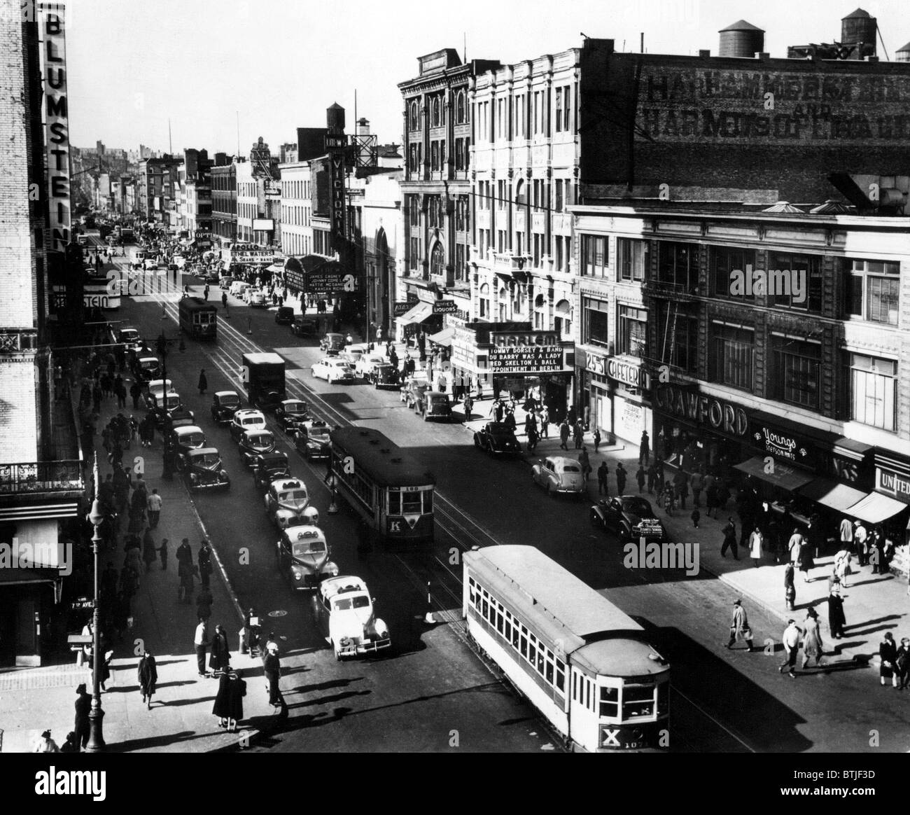 Harlem Thoroughfare on 125th Street, N.Y.C.,  in 1943.   CSU Archives Stock Photo