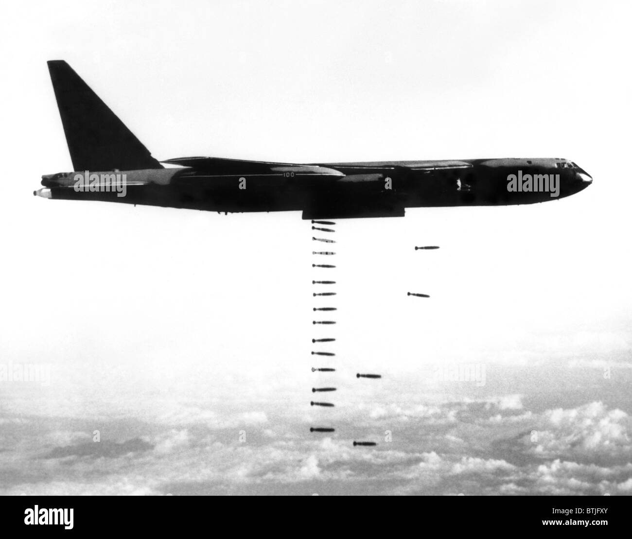 Vietnam War, B-52 Stratofortress (from the Third Air Division's 4133rd Bombardment Wing) releasing a 'bomb train' over targets i Stock Photo