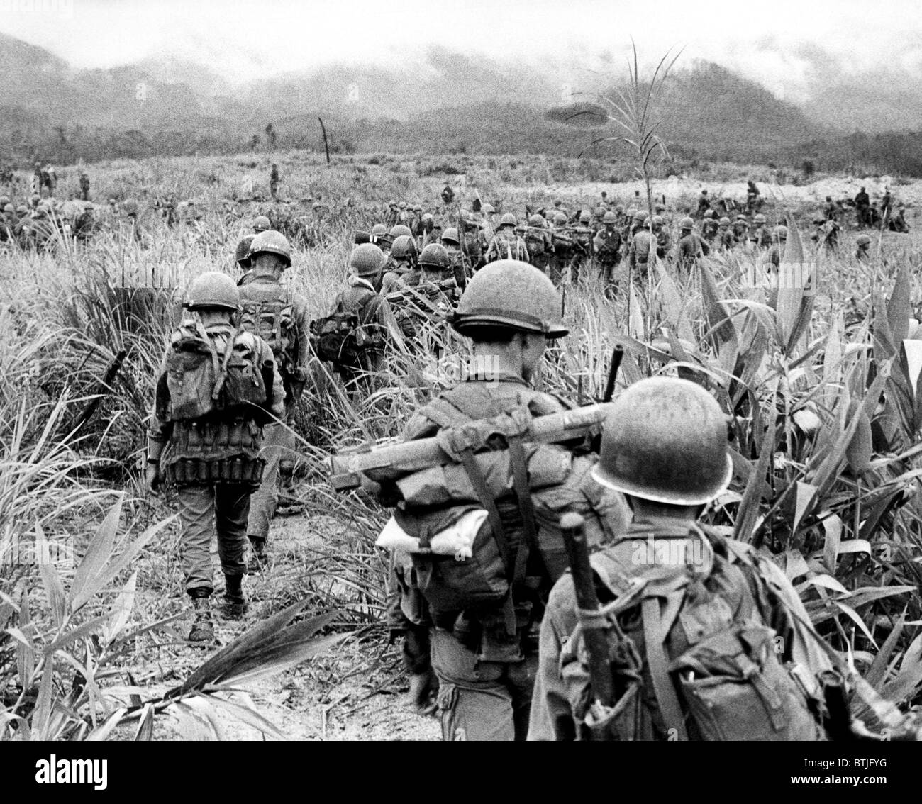 Troopers of the 327th Infantry, 101st Air Cavalry Division patrol the Laotian border during 'Operation Plain', August 14, 1968. Stock Photo