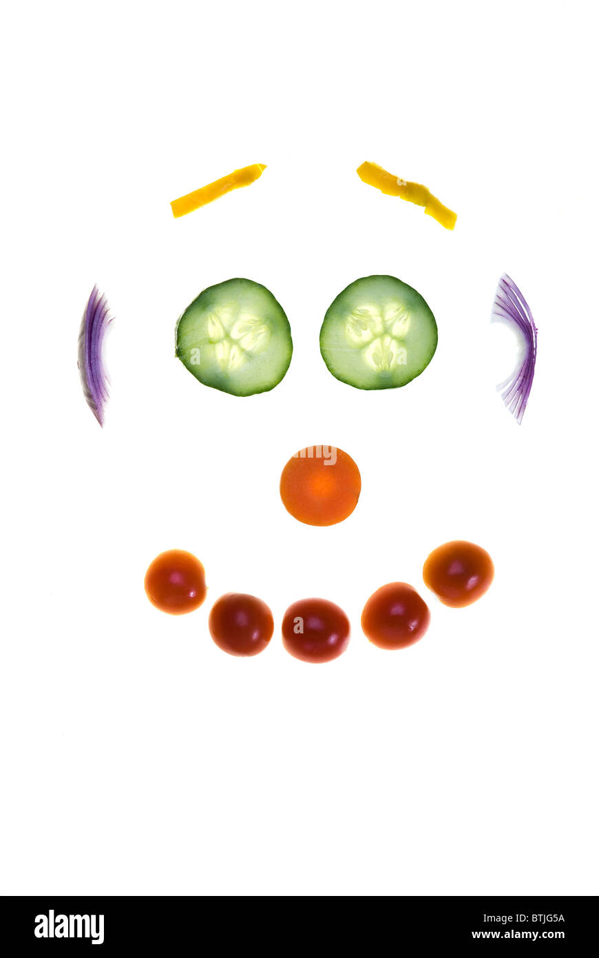 Face made up of vegetables. Stock Photo