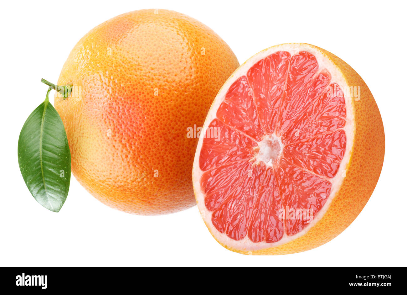 Ripe grapefruit with leaf. Isolated on a white. Stock Photo
