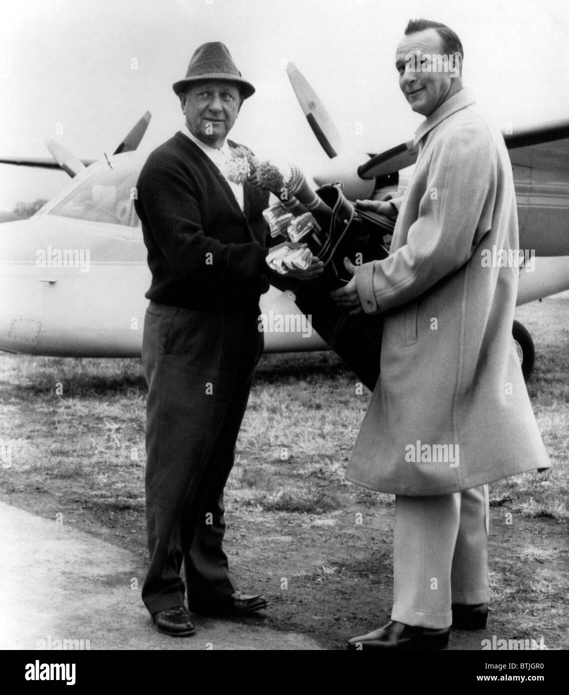 Arnold Palmer (right), American golfer, and his father, M.J. Palmer (left), Latrobe Pennsylvania, November 16, 1963. CSU Archive Stock Photo