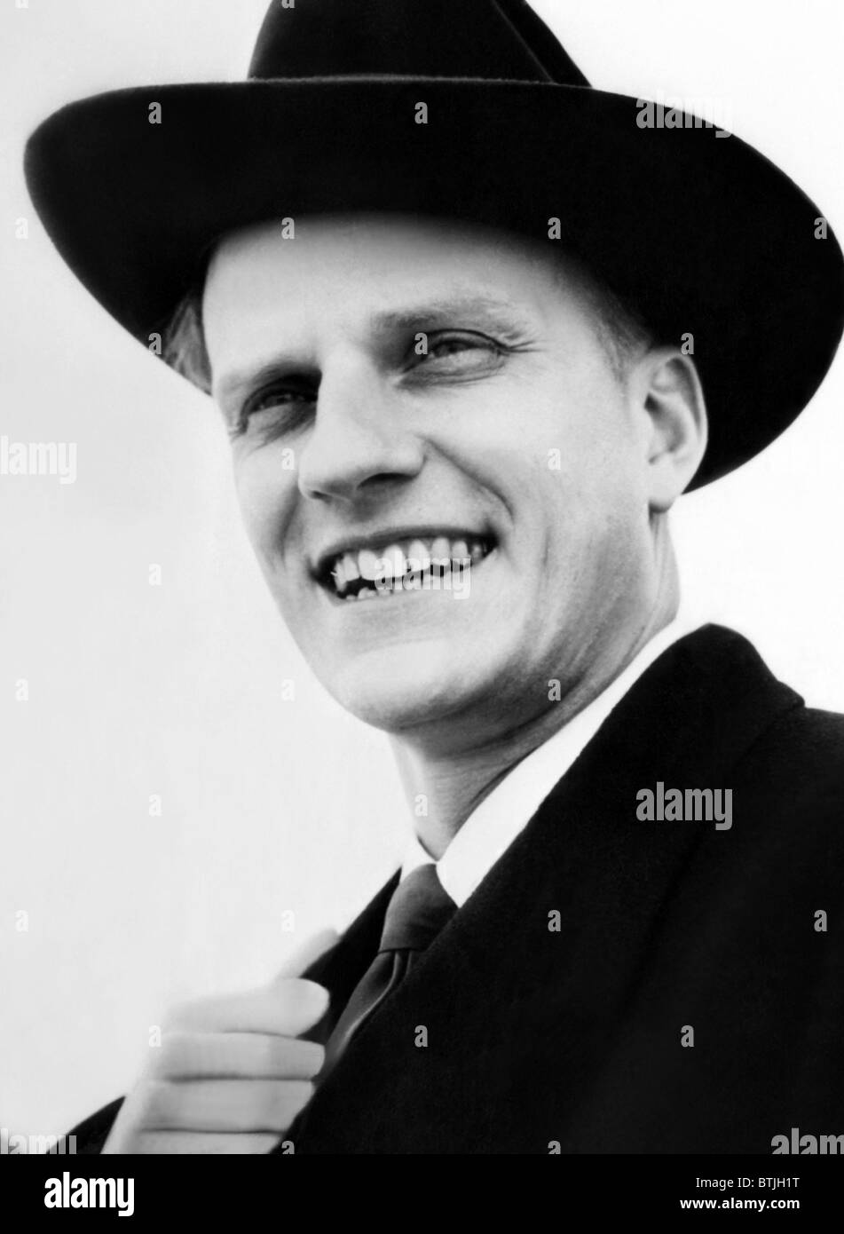 Evangelist, Billy Graham as he arrives in Southampton, England. March