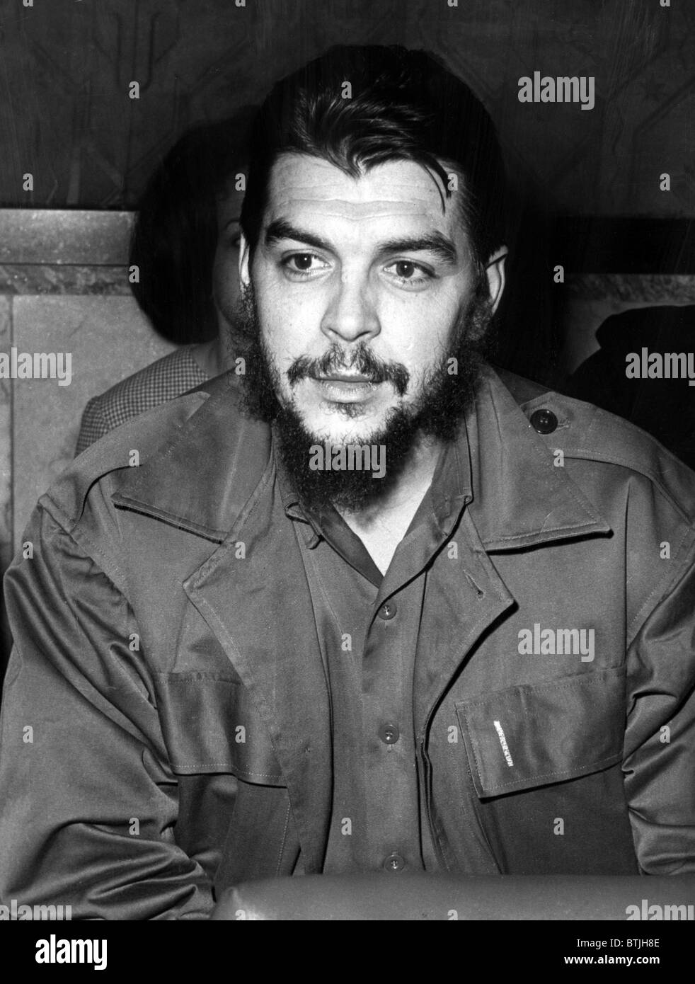 Ernesto 'Che' Guevara steps off a plane in Havana, Cuba, after a three month propaganda tour of the new African nations, March 1 Stock Photo