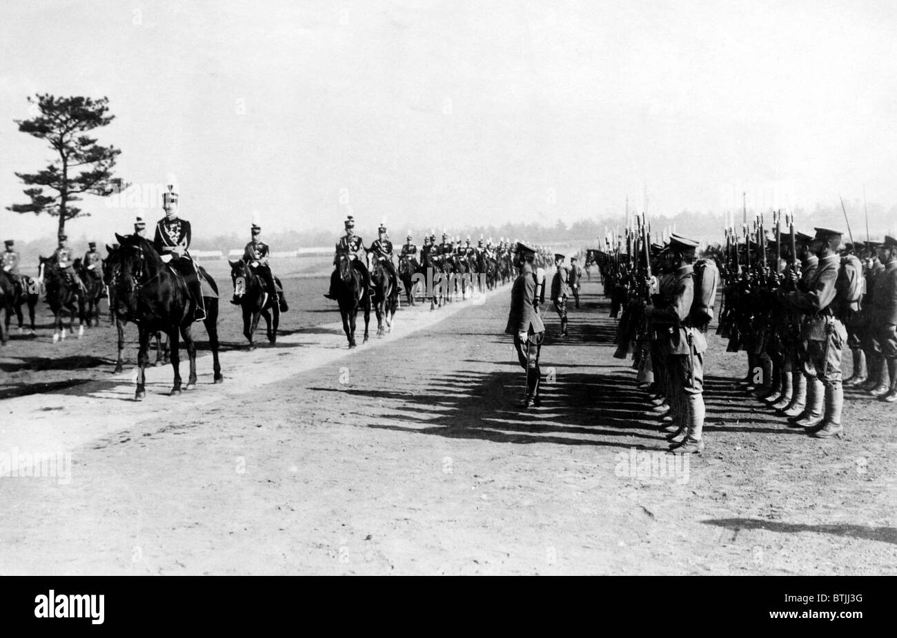 Hirohito, The Price Regent of Japan, reveiwing the regiment of the Japanese Army, ca. 1926. Courtesy: CSU Archives/Everett Colle Stock Photo