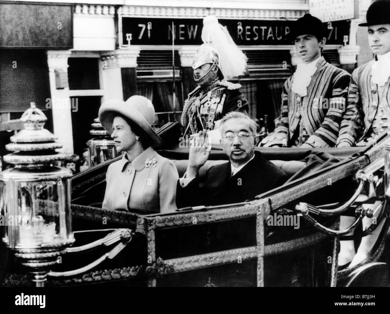 Queen Elizabeth and Emperor Hirohito, ride a carriage from Victoria Station to Buckingham Palace. London, England. October 1971. Stock Photo