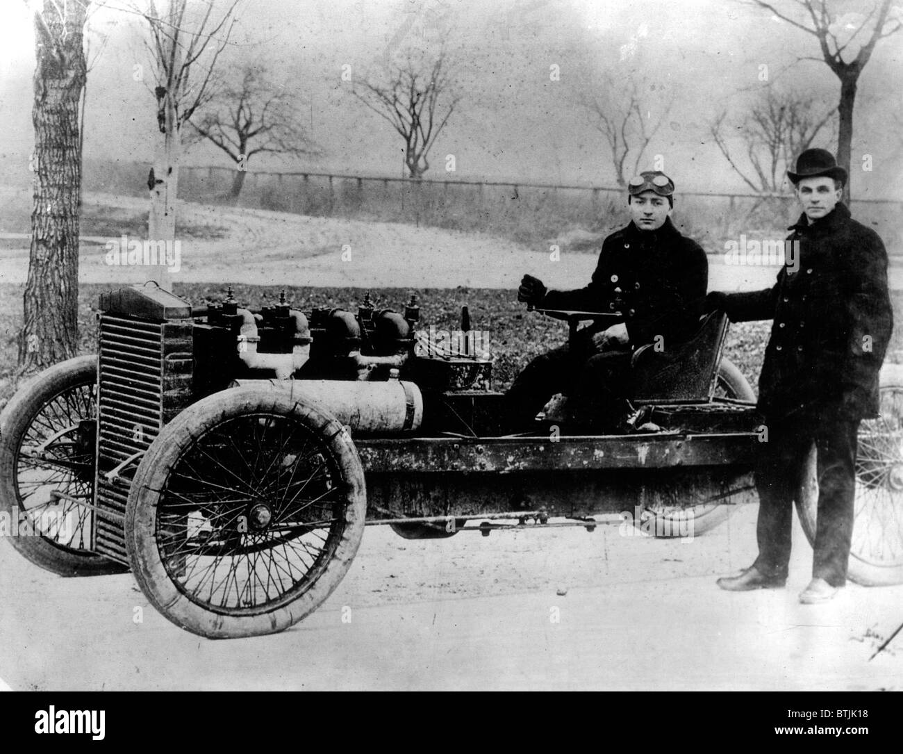 Henry Ford with driver Barney Oldfield in 'Old 99', an early Ford racing car, 1902 Stock Photo