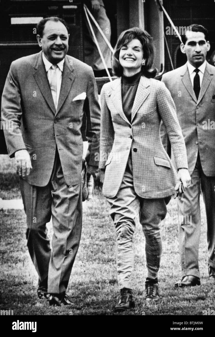 President Ayub Khan (left), of Pakistan, and Jacqueline Kennedy (center), returning from horseback riding. September 25, 1962. C Stock Photo