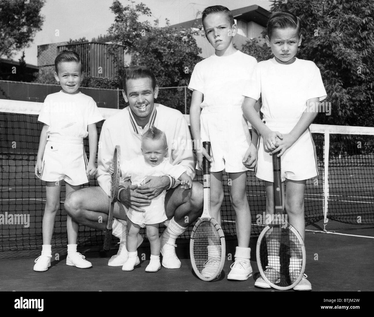 Jack Kramer (second from left) at home with his sons (from left): Bobby, Michael, David, and John, Los Angeles, 1966. Stock Photo