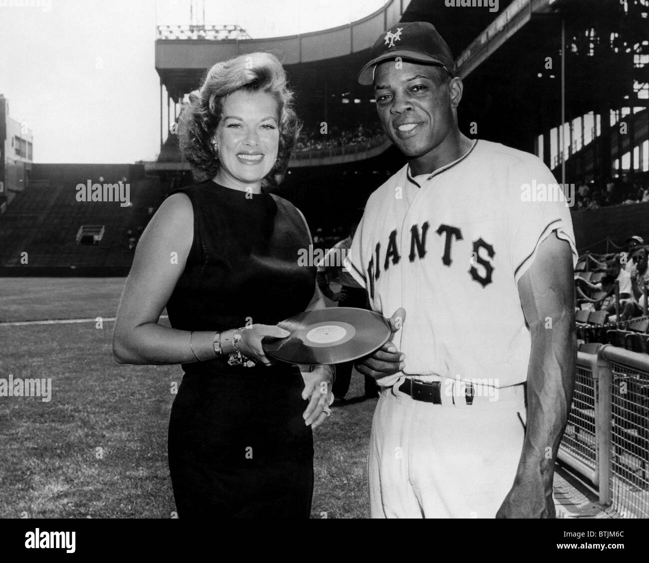 Actress Janis Paige, New York Giants baseball player Willie Mays, 1954. Stock Photo