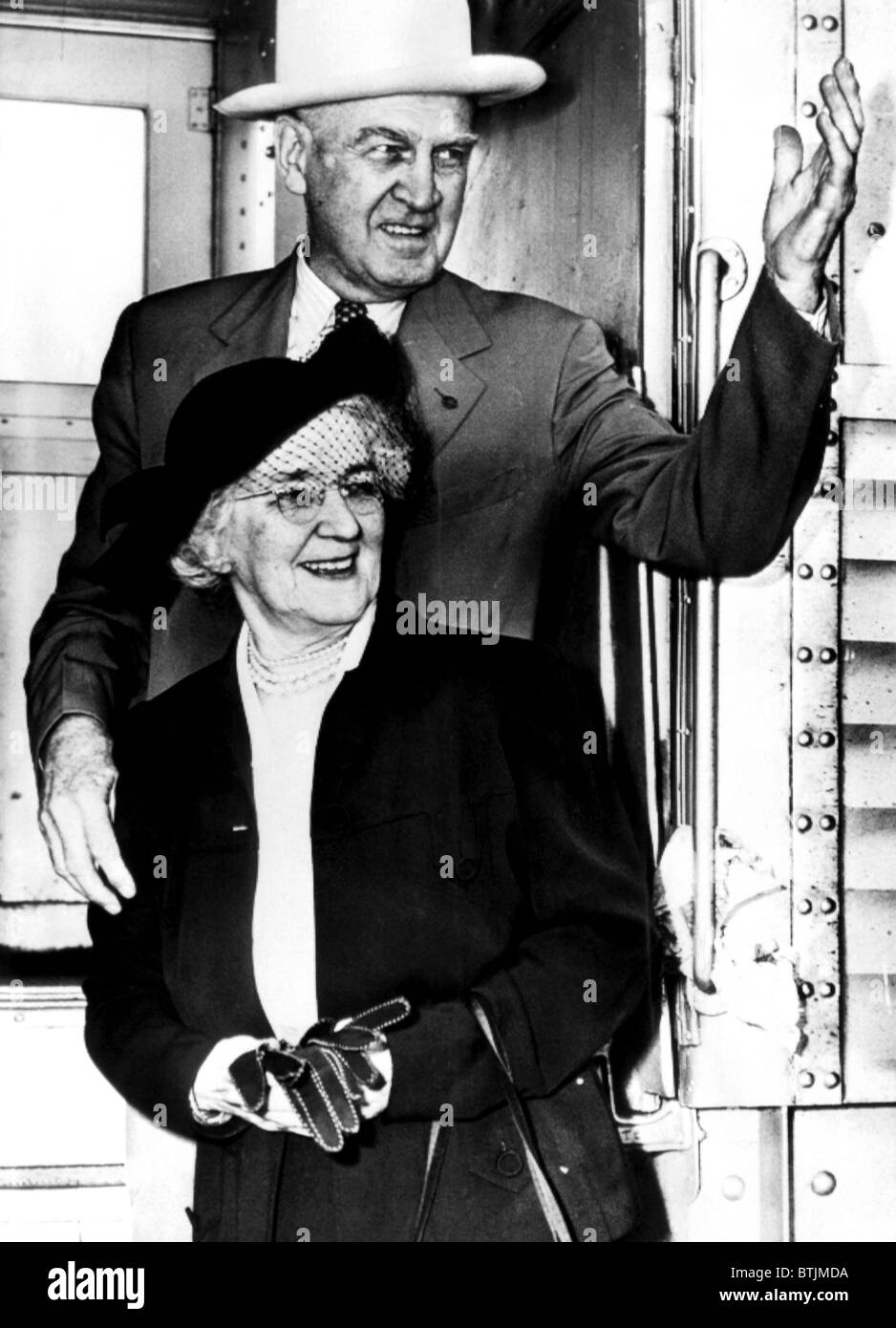 Alexander and Elizabeth Stewart arrive in California to attend the wedding of their son, actor James Stewart to Mrs. Gloria McLe Stock Photo