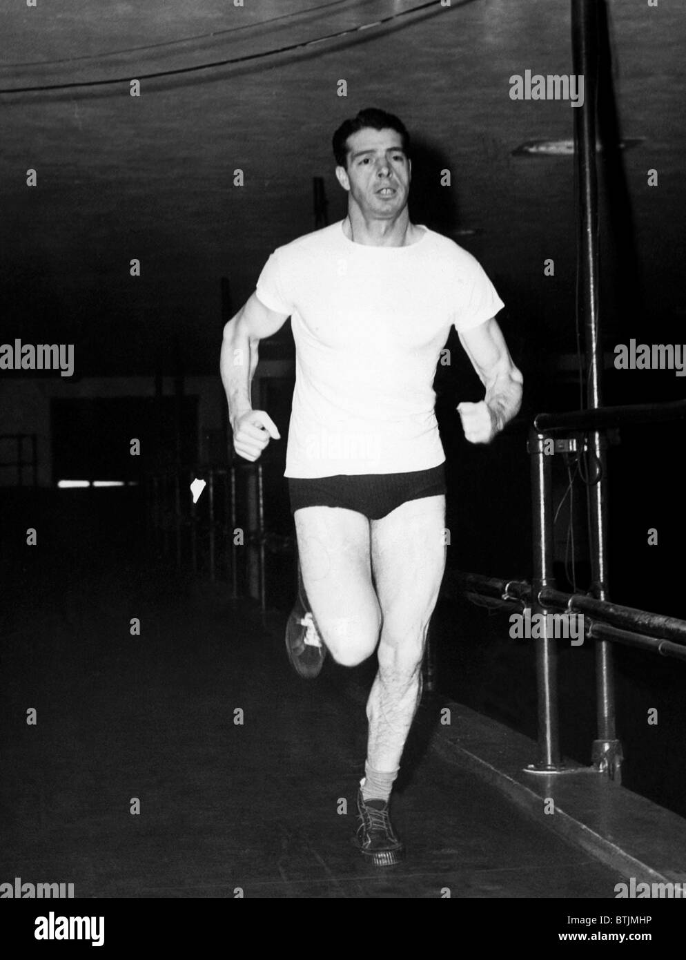 Joe DiMaggio gets into shape before spring training, December 1945. Courtesy: CSU Archives/Everett Collection Stock Photo