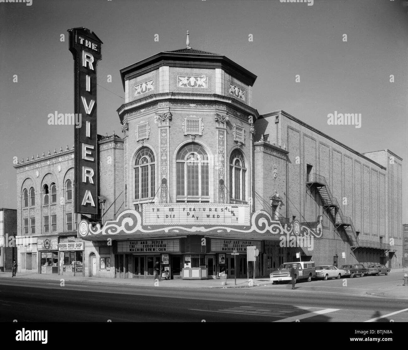 Movie Theaters, the Grand Riviera Theatre, the theater is showing a triple feature: SALT AND PEPPER, THE EXECUTIONER, MACHINE GUN MCCAIN, 9222 Grand River Avenue, Detroit, Michigan, photograph by Allen Stross, October 1970. Stock Photo