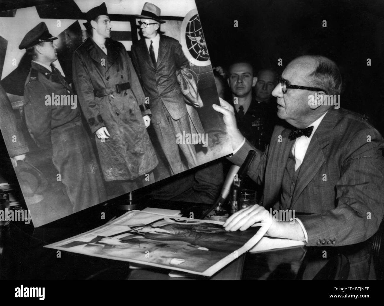 Joseph Welch examines doctored photo during McCarthy Hearings, April 27, 1954. Stock Photo