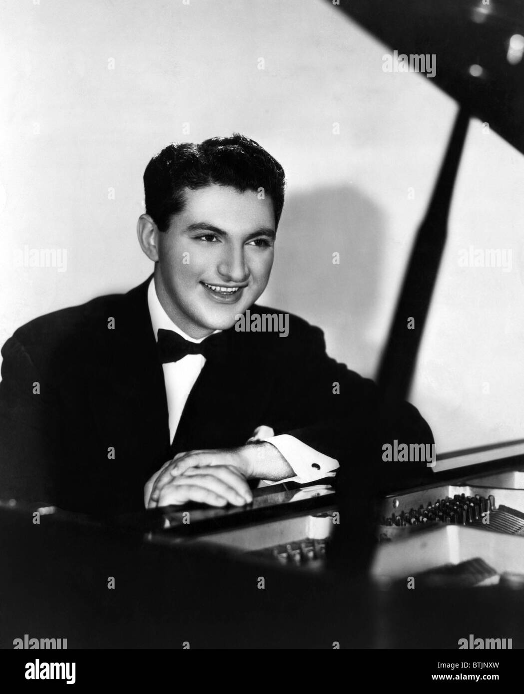 Liberace (1919-1987), American performer and classical pianist. Circa 1940s. CSU Archives/Courtesy Everett Collection Stock Photo
