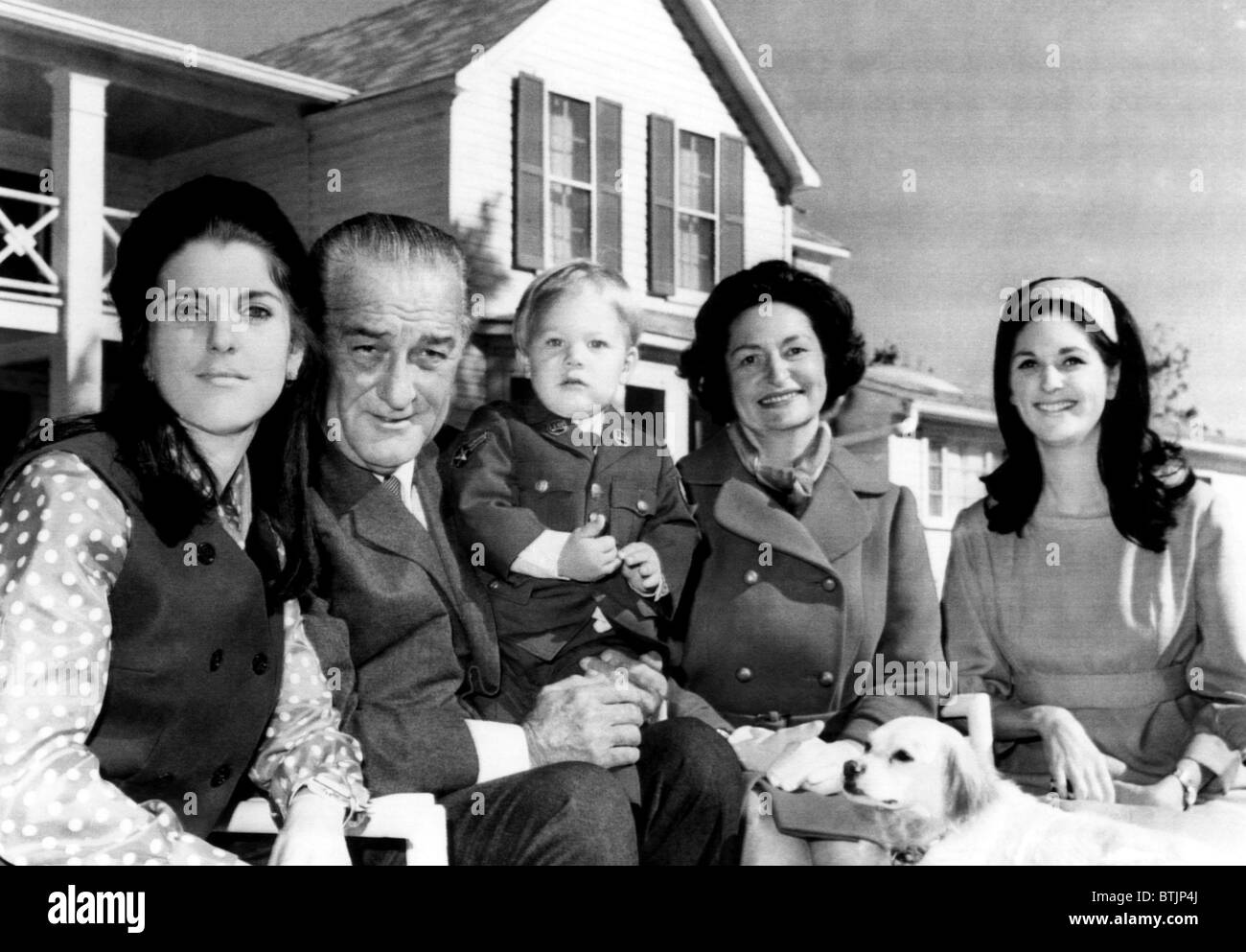 The first family pose for pictures on the front lawn of the LBJ Ranch shortly after attending Thanksgiving services in Frederick Stock Photo