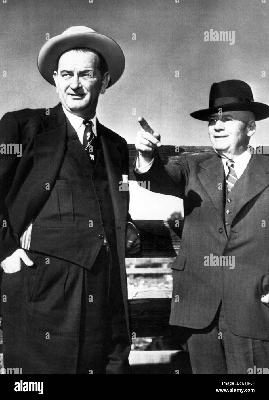 Senator Lyndon B. Johnson and House Speaker designate Sam Rayburn on  his farm in Bohnham, Texas. November 1954. Courtesy: CSU A Stock Photo
